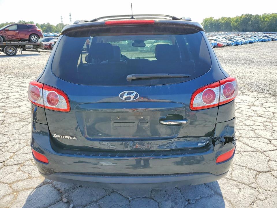 Photo 6 from auction – 2012 HYUNDAI SANTA FE with VIN 5XYZK3AB3CG130856