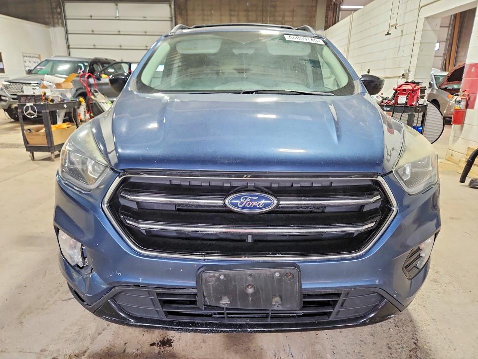 Photo 5 from auction – 2018 FORD ESCAPE with VIN 1FMCU9GD6JUA27000