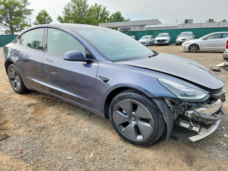 Photo 4 from auction – 2022 TESLA MODEL 3 with VIN 5YJ3E1EA4NF298843
