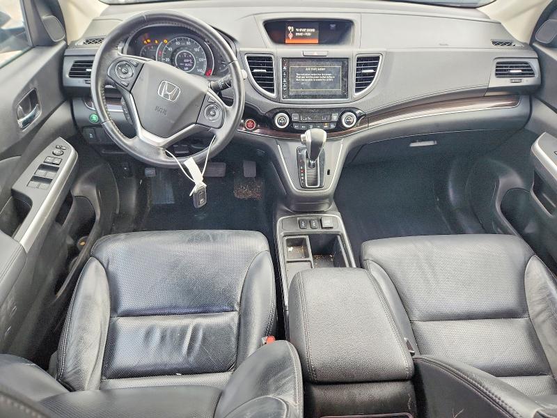Photo 8 from auction – 2016 HONDA CR-V with VIN 2HKRM4H70GH703325