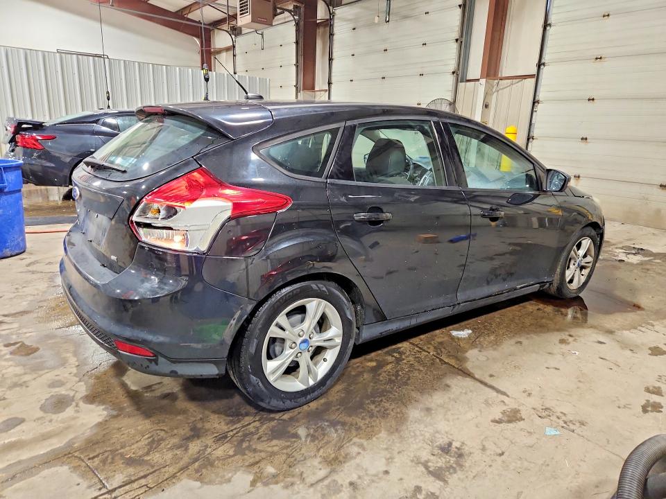 Photo 3 from auction – 2014 FORD FOCUS with VIN 1FADP3K29EL226997
