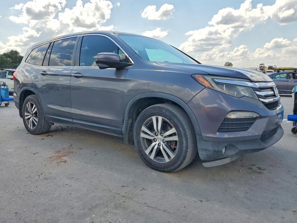 Photo 4 from auction – 2016 HONDA PILOT with VIN 5FNYF5H3XGB025528
