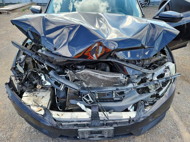 Photo 11 from auction – 2016 HONDA CIVIC with VIN 2HGFC2F53GH022999