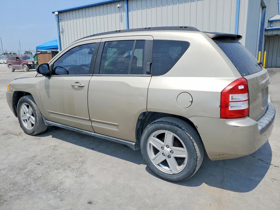 Photo 2 from auction – 2010 JEEP COMPASS with VIN 1J4NT4FB5AD502794