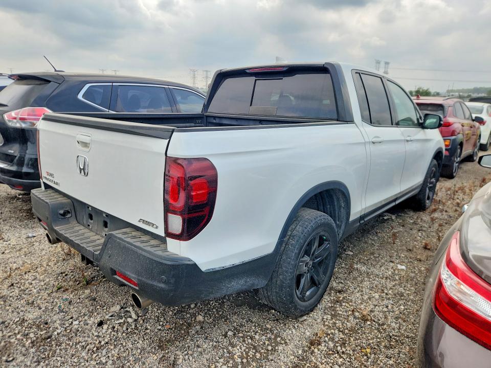 Photo 3 from auction – 2023 HONDA RIDGELINE with VIN 5FPYK3F80PB020599
