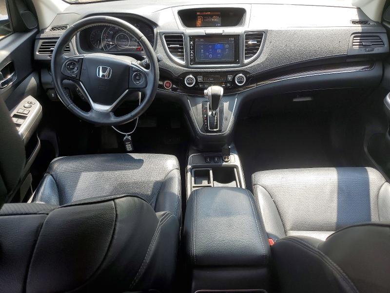 Photo 8 from auction – 2016 HONDA CR-V with VIN 2HKRM4H71GH695851