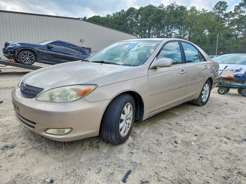 TOYOTA CAMRY 2004 with VIN 4T1BF30K74U574146 - Photo from auction