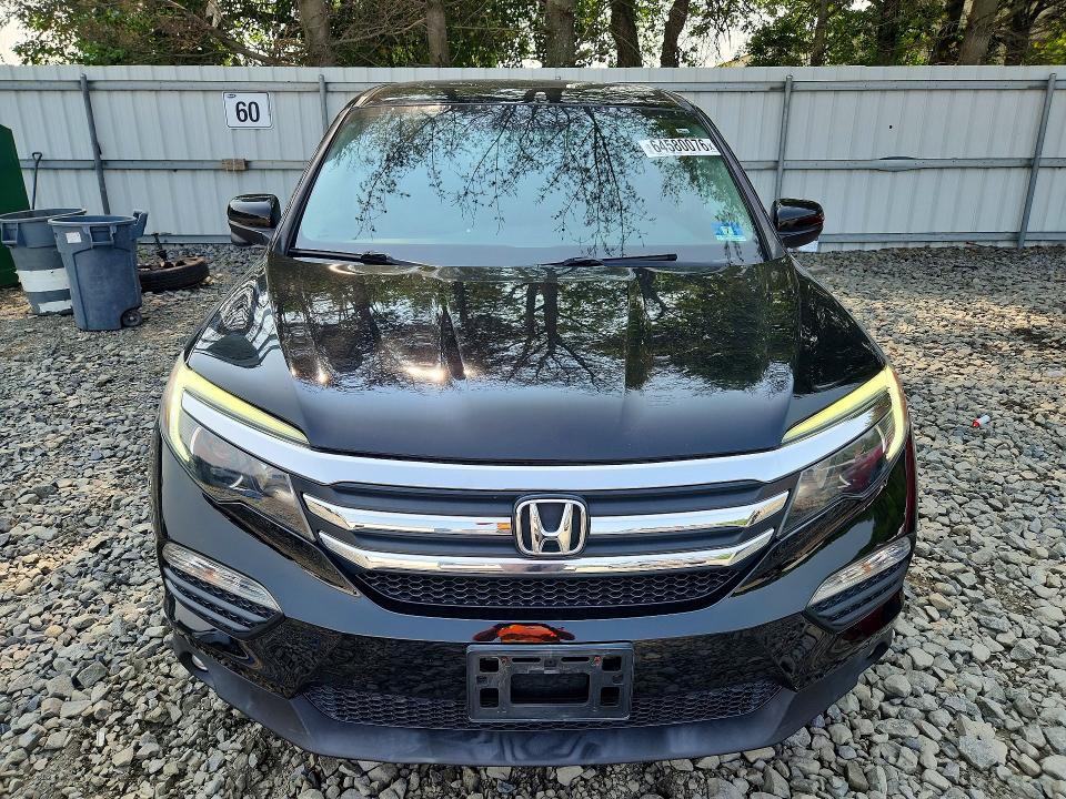 Photo 5 from auction – 2018 HONDA PILOT with VIN 5FNYF6H51JB054785