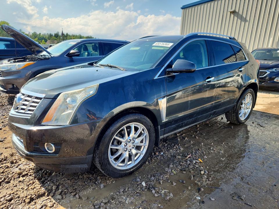 CADILLAC SRX 2014 with VIN 3GYFNDE31ES685173 - Photo from auction