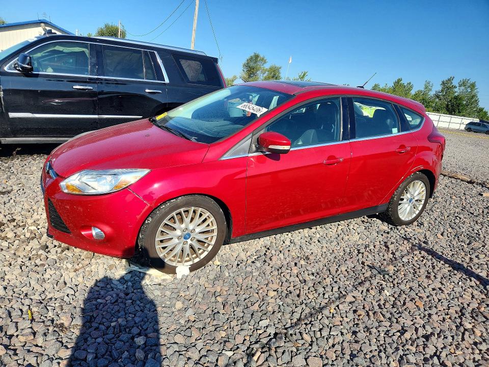 FORD FOCUS 2012 with VIN 1FAHP3M28CL283106 - Photo from auction