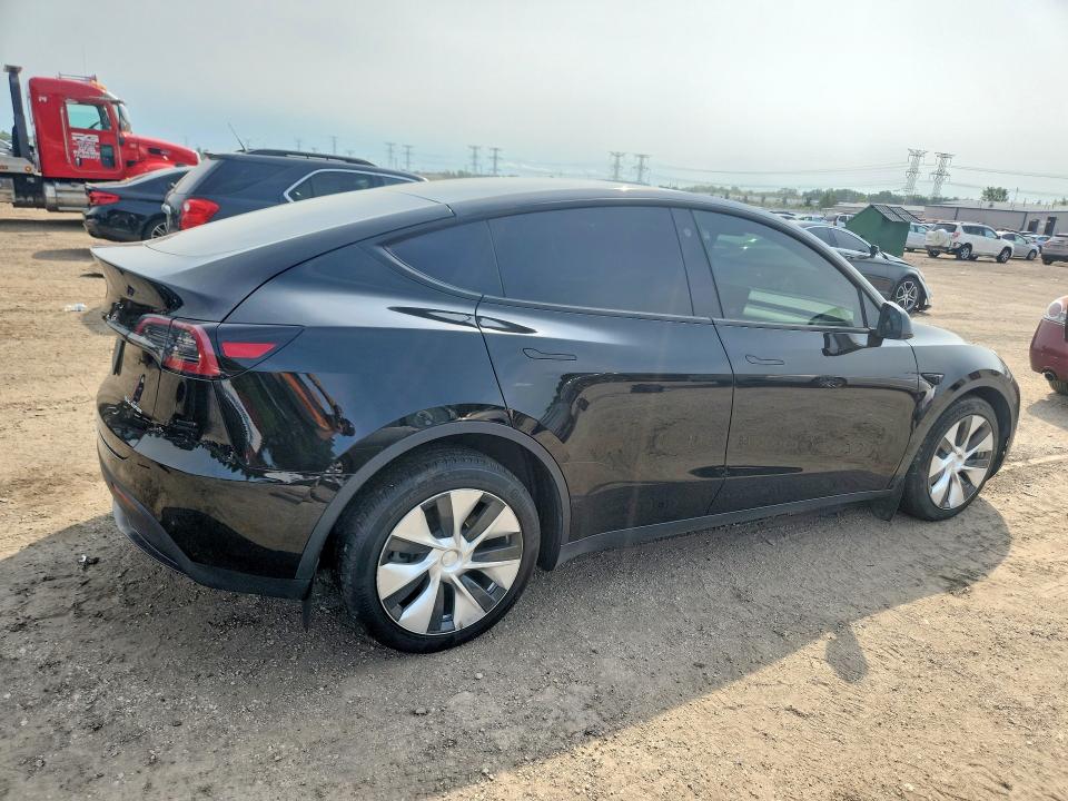 Снимка 3 от търг – 2023 TESLA MODEL Y с VIN 7SAYGDEE2PF668455