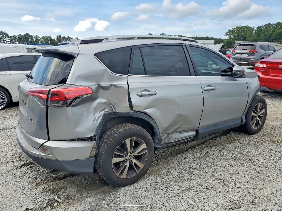 Photo 3 from auction – 2018 TOYOTA RAV4 with VIN JTMWFREV3JJ174027