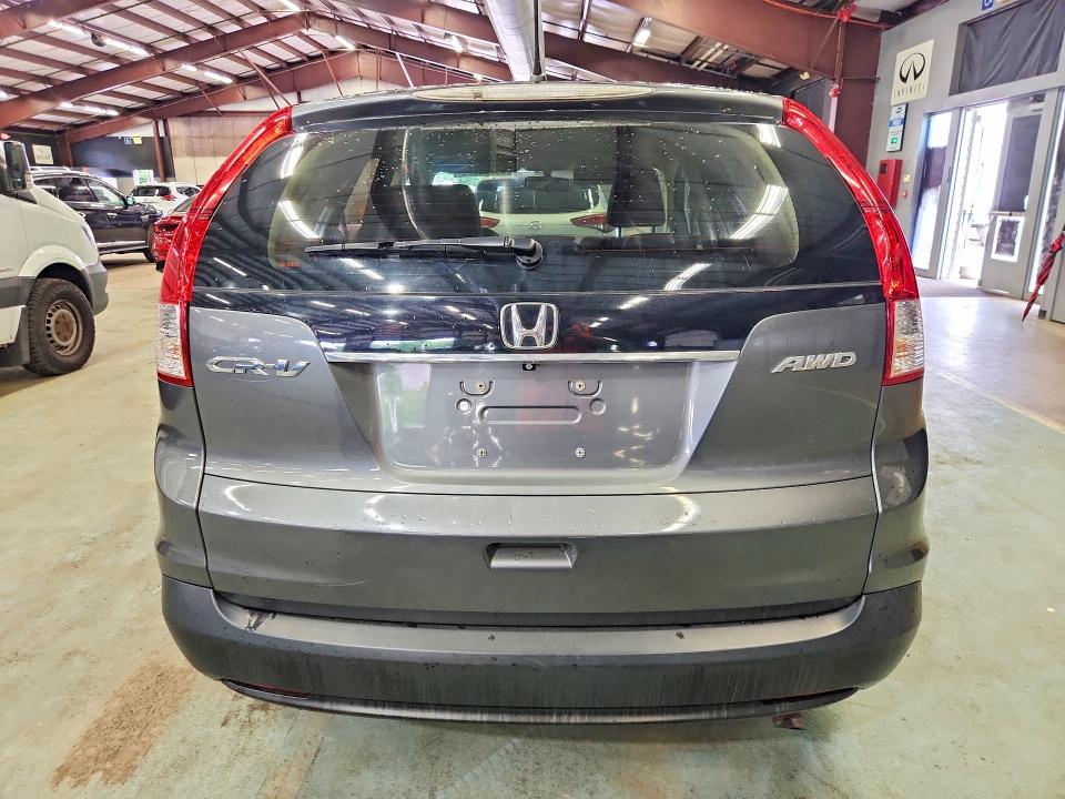 Photo 6 from auction – 2014 HONDA CR-V with VIN 5J6RM4H33EL034399