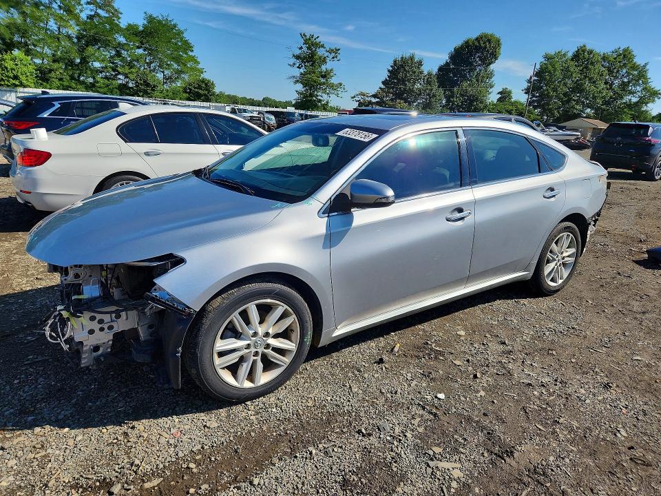 TOYOTA AVALON 2015 with VIN 4T1BK1EB1FU177690 - Photo from auction