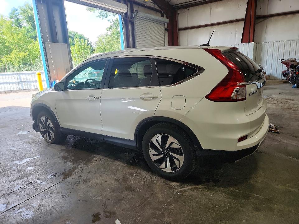 Photo 2 from auction – 2016 HONDA CR-V with VIN 5J6RM4H95GL047632