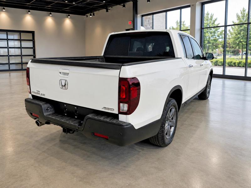 Photo 4 from auction – 2022 HONDA RIDGELINE with VIN 5FPYK3F75NB029741