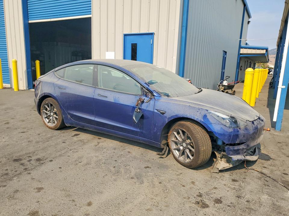 Photo 4 from auction – 2022 TESLA MODEL 3 with VIN 5YJ3E1EB2NF275926