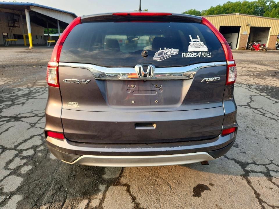 Photo 6 from auction – 2016 HONDA CR-V with VIN 2HKRM4H50GH672673