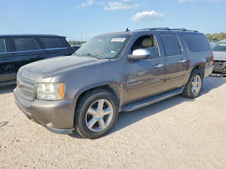 CHEVROLET SUBURBAN 2011 with VIN 1GNSCJE07BR334398 - Photo from auction
