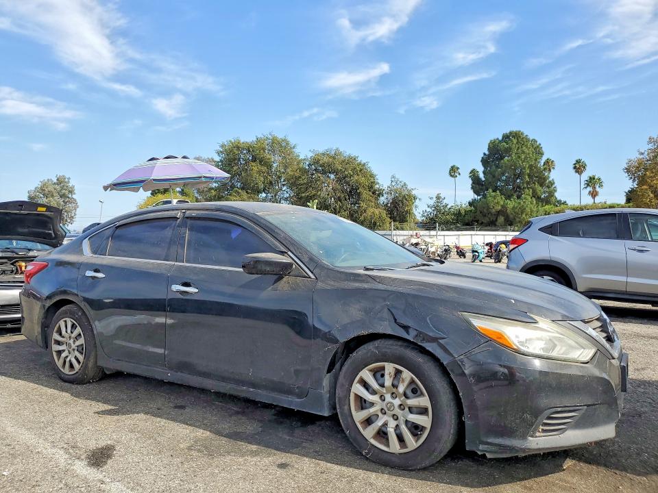 Photo 4 from auction – 2016 NISSAN ALTIMA with VIN 1N4AL3AP0GC255335