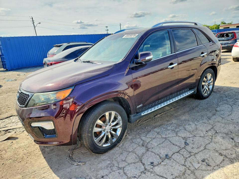 KIA SORENTO 2012 with VIN 5XYKWDA28CG249563 - Photo from auction