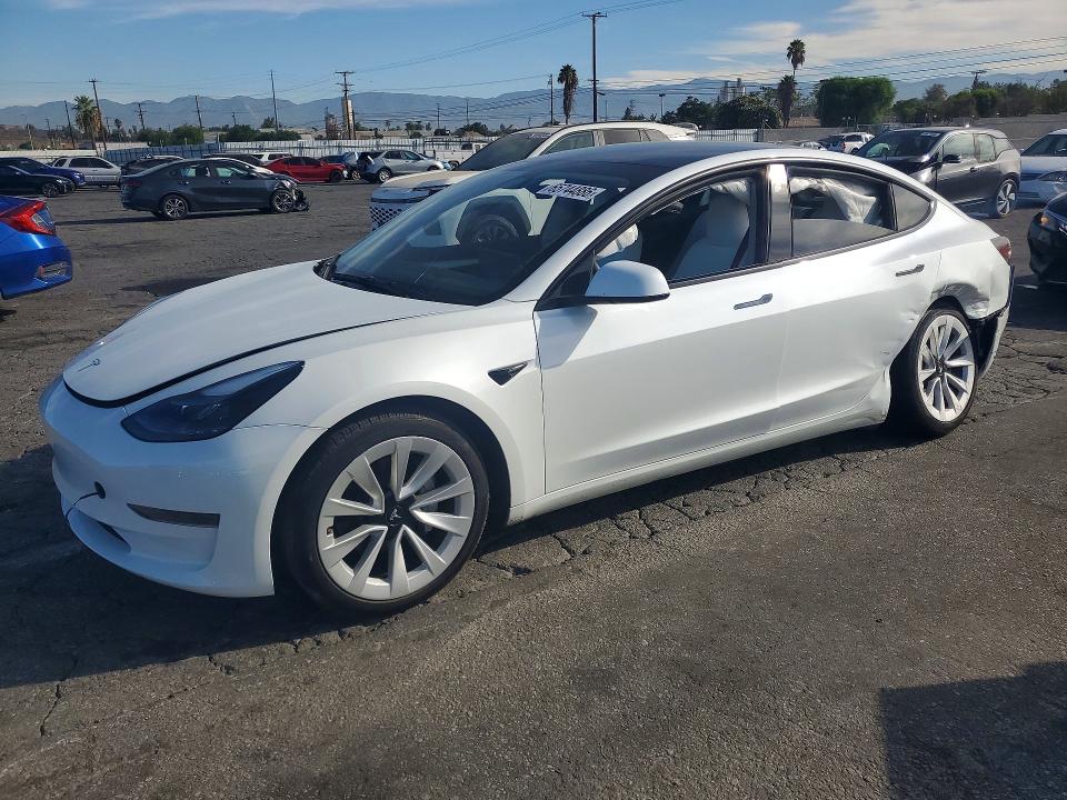 TESLA MODEL 3 2023 with VIN 5YJ3E1EAXPF647944 - Photo from auction