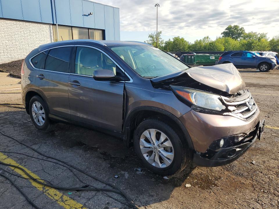Photo 4 from auction – 2014 HONDA CR-V with VIN 2HKRM3H79EH546837