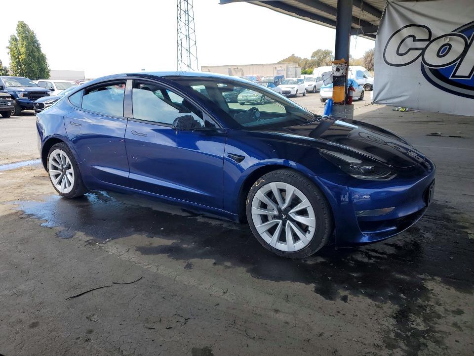 Photo 4 from auction – 2022 TESLA MODEL 3 with VIN 5YJ3E1EAXNF143469