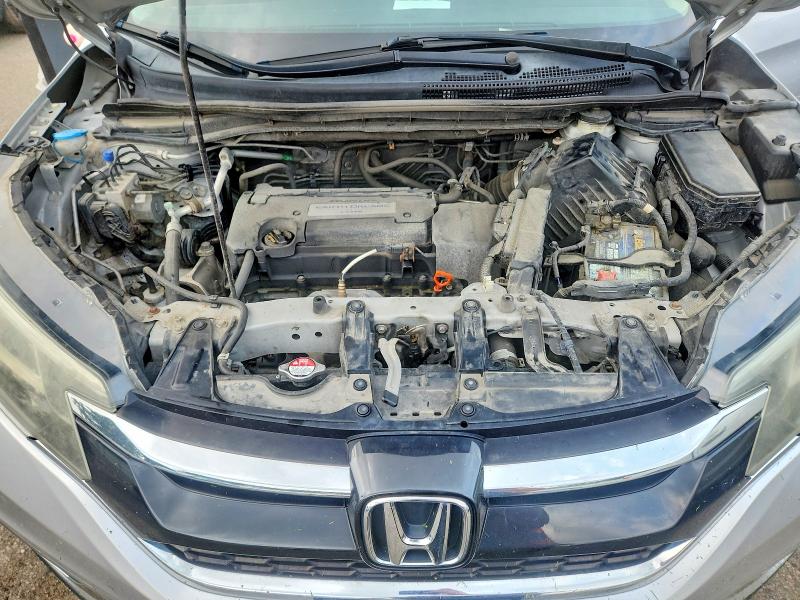 Photo 12 from auction – 2015 HONDA CR-V with VIN 2HKRM4H79FH617946