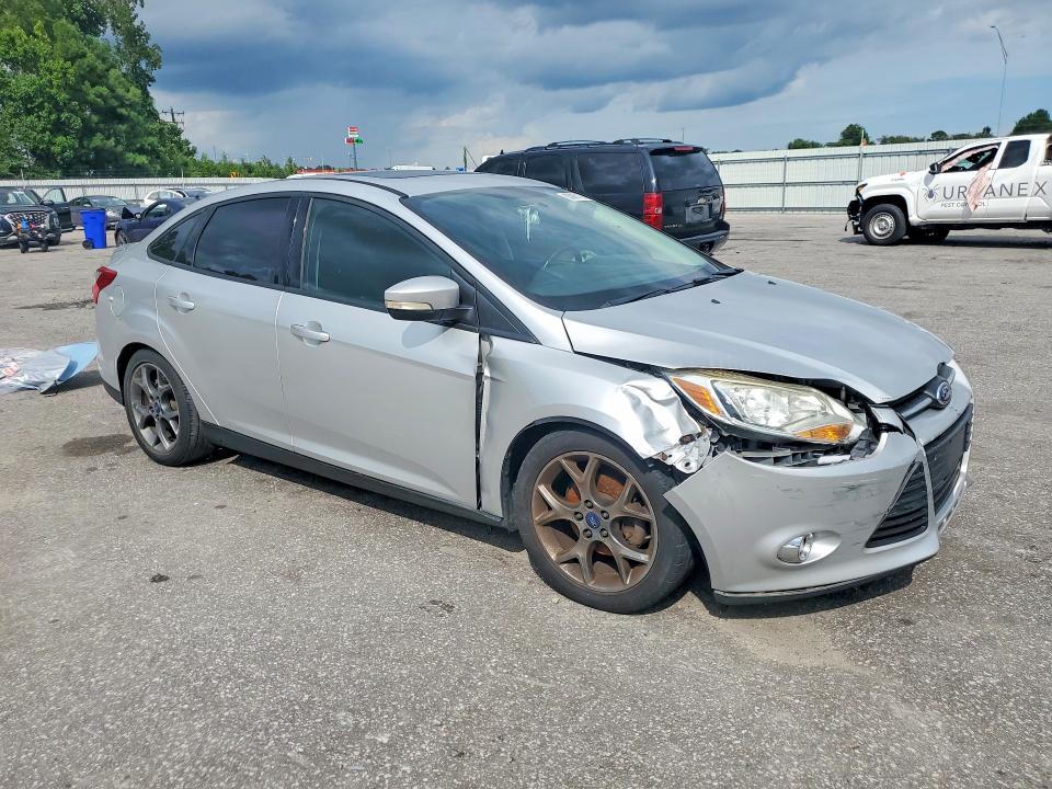 Photo 4 from auction – 2014 FORD FOCUS with VIN 1FADP3F23EL102346