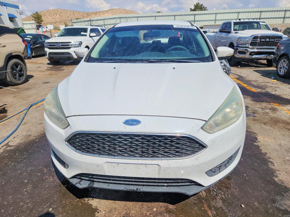 Photo 5 from auction – 2016 FORD FOCUS with VIN 1FADP3F20GL352890