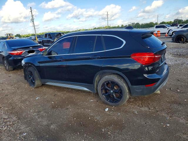 Photo 2 from auction – 2019 BMW X1 with VIN WBXHU7C52K5L10618