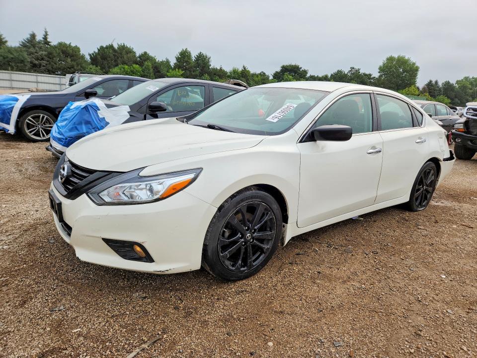 NISSAN ALTIMA 2018 with VIN 1N4AL3AP0JC161866 - Photo from auction