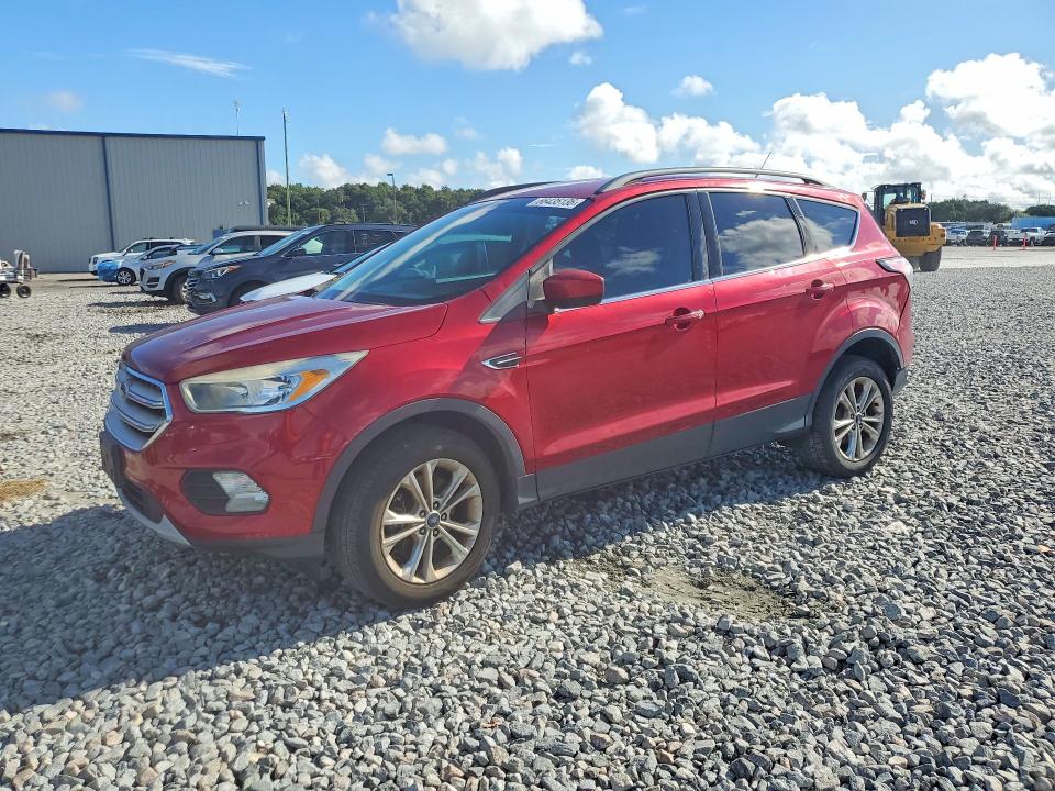 FORD ESCAPE 2018 with VIN 1FMCU9GD7JUB68500 - Photo from auction