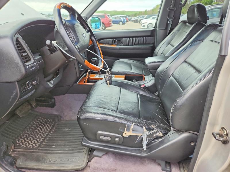 Photo 7 from auction – 2003 INFINITI QX4 with VIN JNRDR09Y13W300812