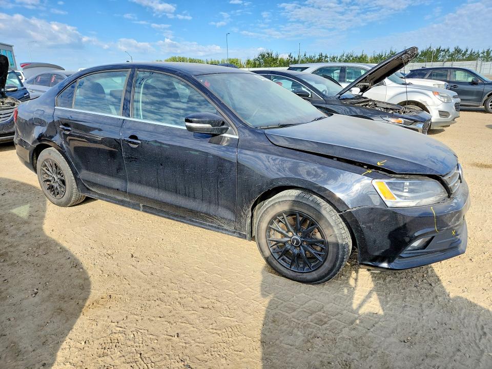 Photo 4 from auction – 2015 VOLKSWAGEN JETTA with VIN 3VWD07AJ6FM323098