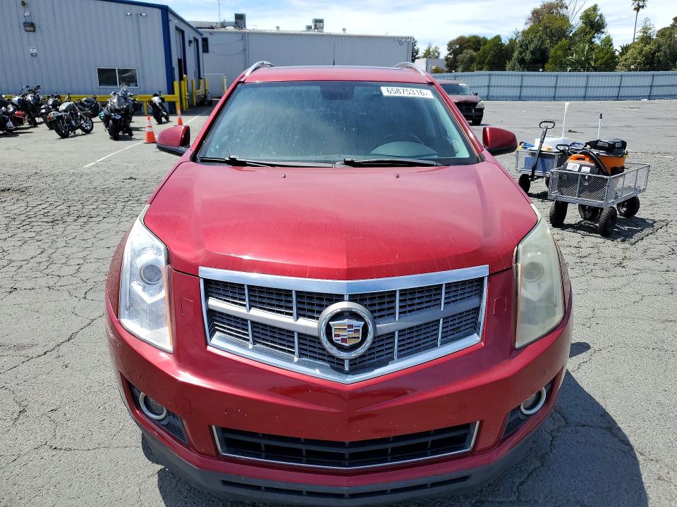 Foto 5 de la subasta – 2011 CADILLAC SRX con VIN 3GYFNBEYXBS600522
