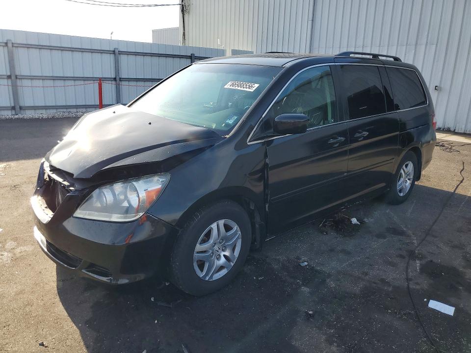 HONDA ODYSSEY 2007 with VIN 5FNRL38757B100138 - Photo from auction