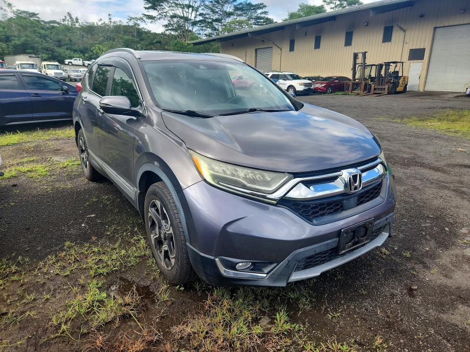Photo 4 from auction – 2019 HONDA CR-V with VIN JHLRW2H95KX021573