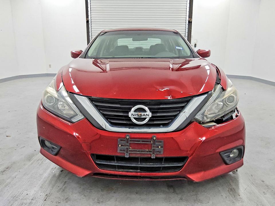 Photo 5 from auction – 2018 NISSAN ALTIMA with VIN 1N4AL3AP5JC197259