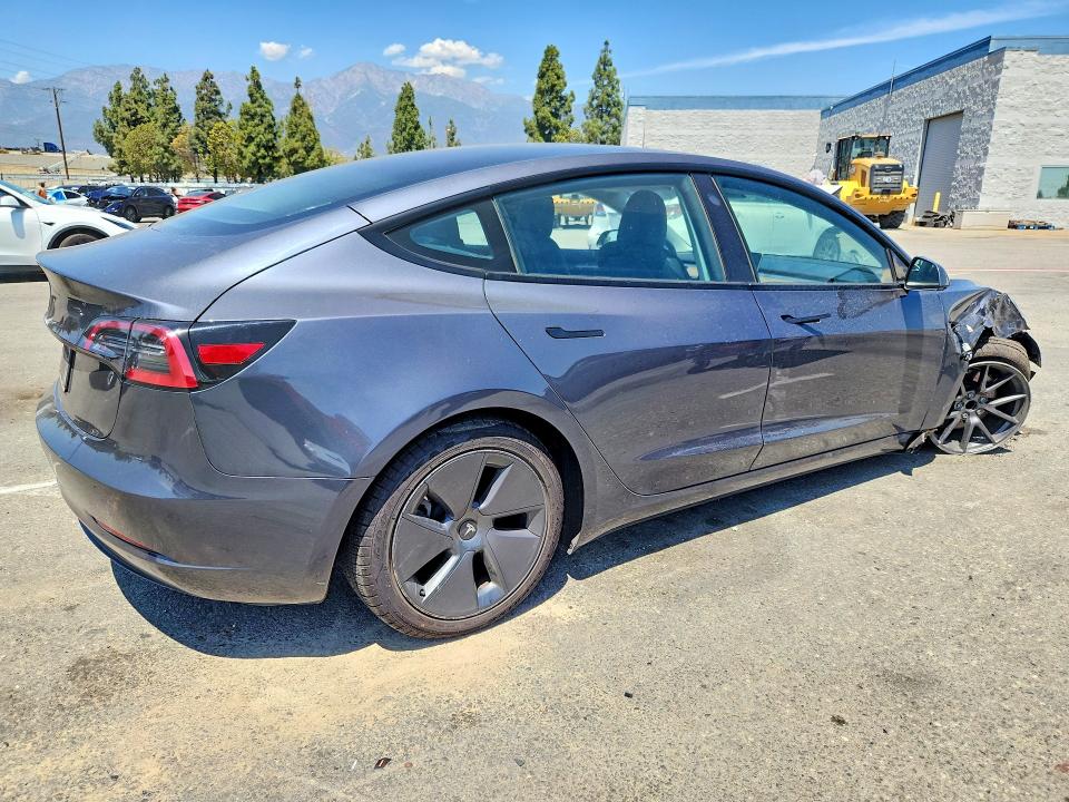 Photo 3 from auction – 2023 TESLA MODEL 3 with VIN 5YJ3E1EA4PF692569