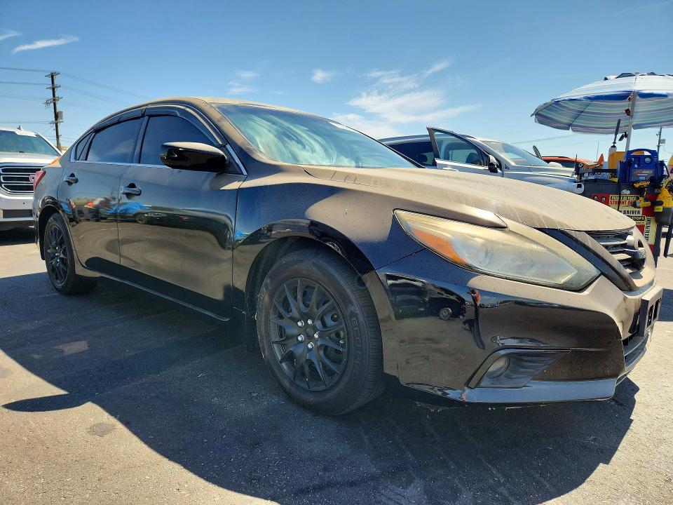 Photo 4 from auction – 2017 NISSAN ALTIMA with VIN 1N4AL3AP1HC495690