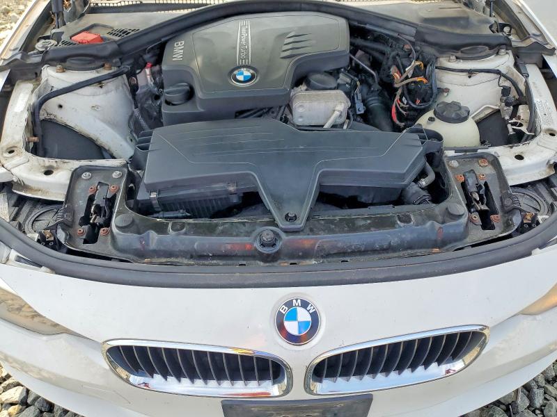 Photo 11 from auction – 2013 BMW 3 SERIES with VIN WBA3B5C57DF597997