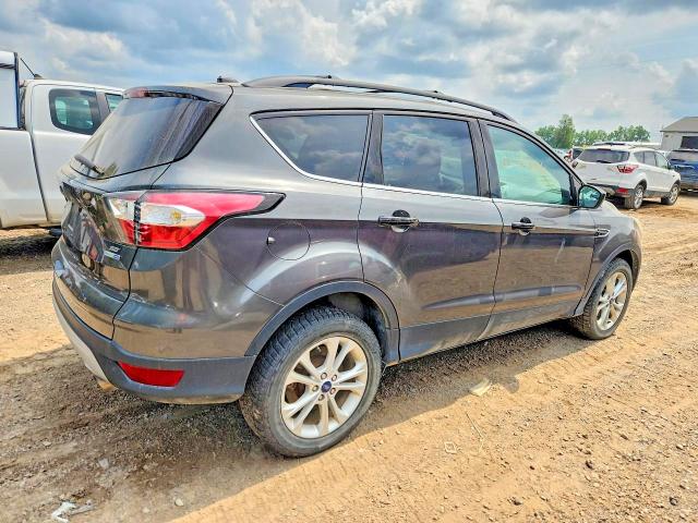Photo 3 from auction – 2017 FORD ESCAPE with VIN 1FMCU9G92HUB07299