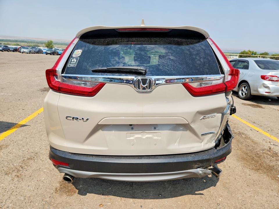 Photo 6 from auction – 2018 HONDA CR-V with VIN 5J6RW2H97JL004285