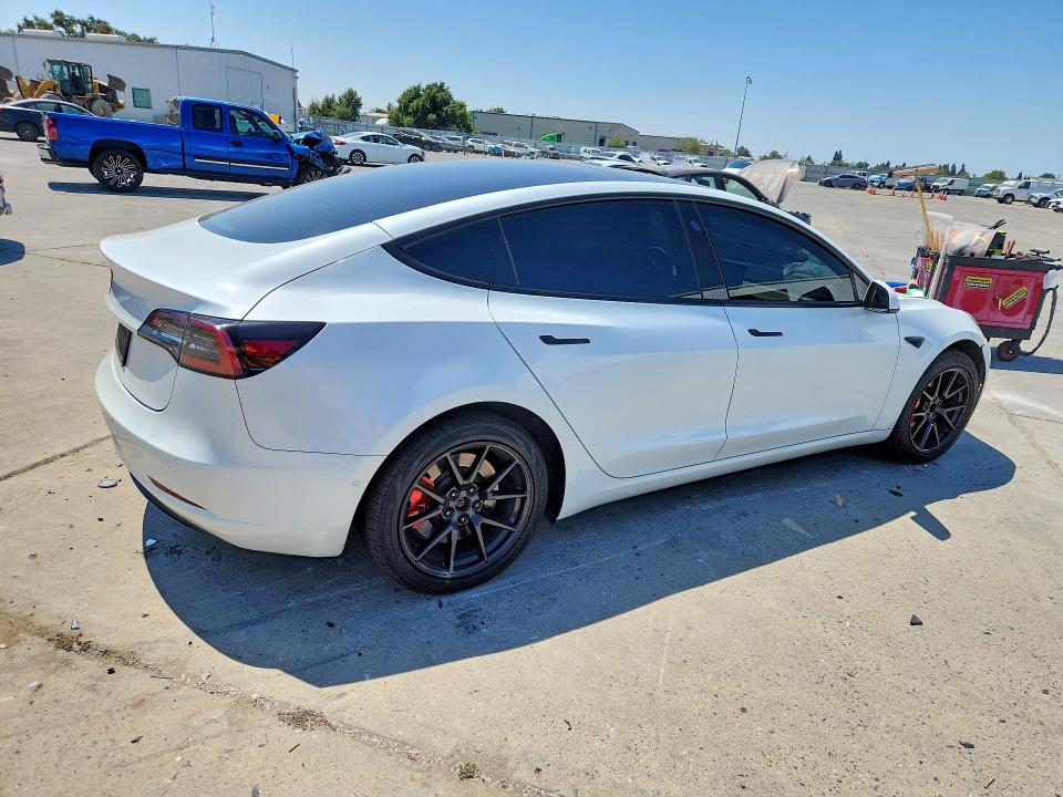 Photo 3 from auction – 2021 TESLA MODEL 3 with VIN 5YJ3E1EA0MF868142