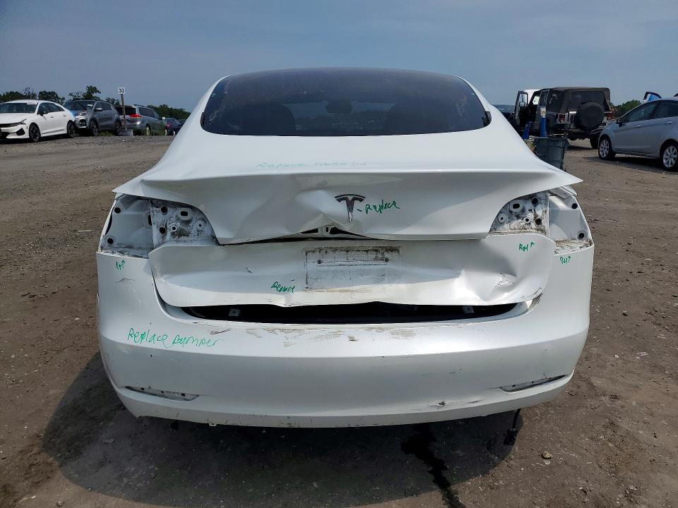 Photo 6 from auction – 2023 TESLA MODEL 3 with VIN 5YJ3E1EA9PF550590