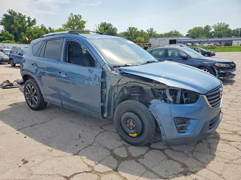 Photo 4 from auction – 2016 MAZDA CX-5 with VIN JM3KE4DY7G0909033