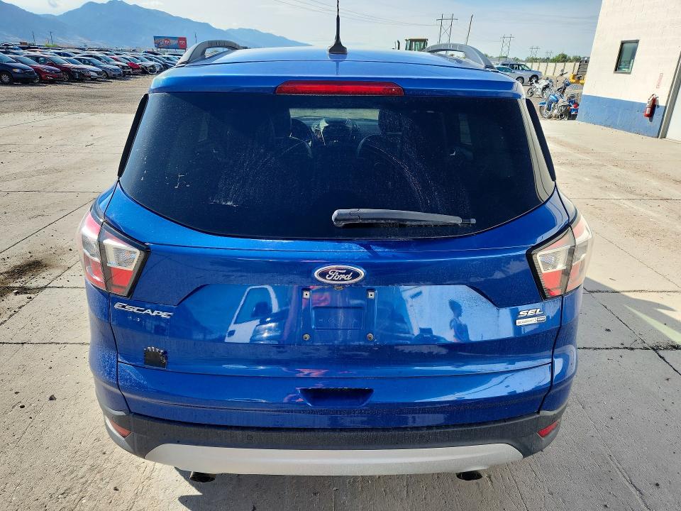Photo 6 from auction – 2018 FORD ESCAPE with VIN 1FMCU9HD1JUD15439
