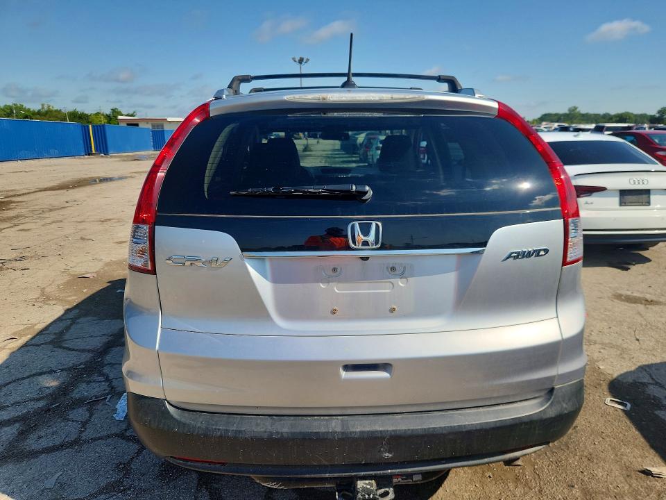 Photo 6 from auction – 2013 HONDA CR-V with VIN 2HKRM4H75DH634501